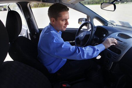 Inspecting the interior of a used car                                                                                                                                                                                                                     