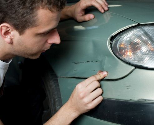 Inspecting a used car                                                                                                                                                                                                                                     